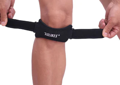 Elektrisk knæmassageapparat